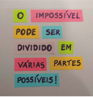 Imagem contendo a frase: O impossível pode ser dividido em várias partes possíveis!